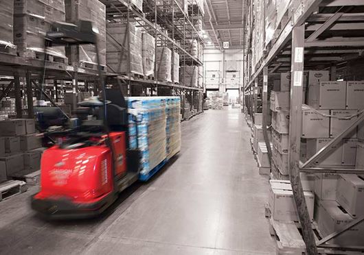 Raymond Courier Automated Lift Truck in Warehouse Aisle
